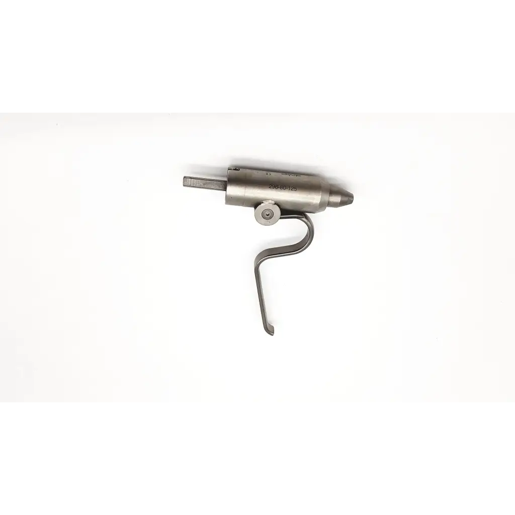 Silver metallic trigger mechanism with curved lever and engraved markings on stryker orthopedic pin driver attachment