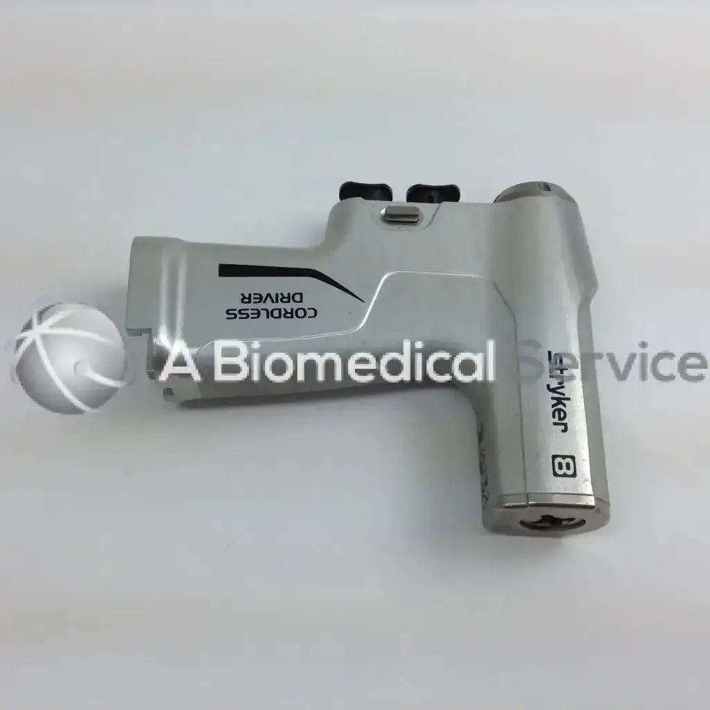 Silver stryker 4505 system 8 cordless driver set with micro 100 and aesculap case featuring black accents and ergonomic design