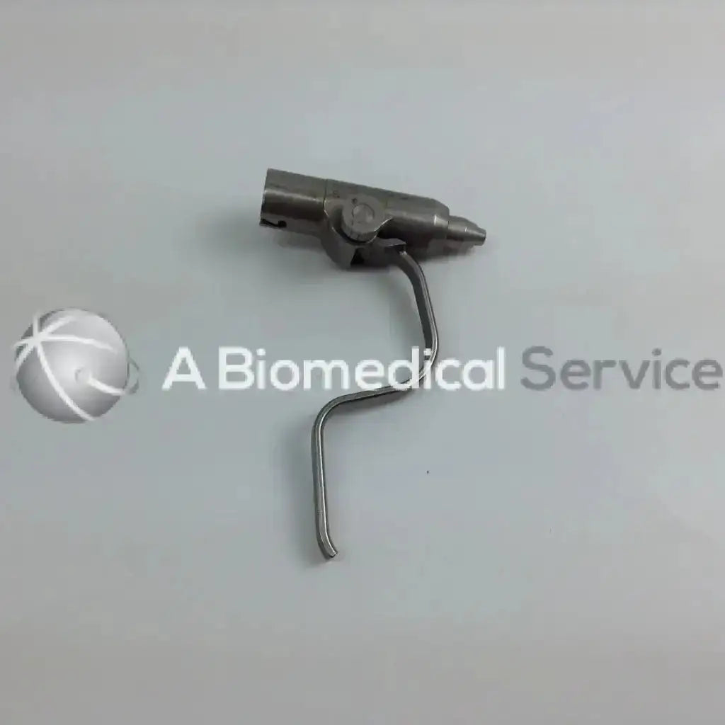 Silver metallic surgical cordless driver with curved handle and articulated head in aesculap case driver set