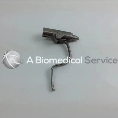 Silver metallic surgical cordless driver with curved handle and articulated head in aesculap case driver set