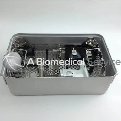 Silver stainless steel surgical instrument sterilization basket with white sphere for stryker 4505 cordless driver set aesculap case