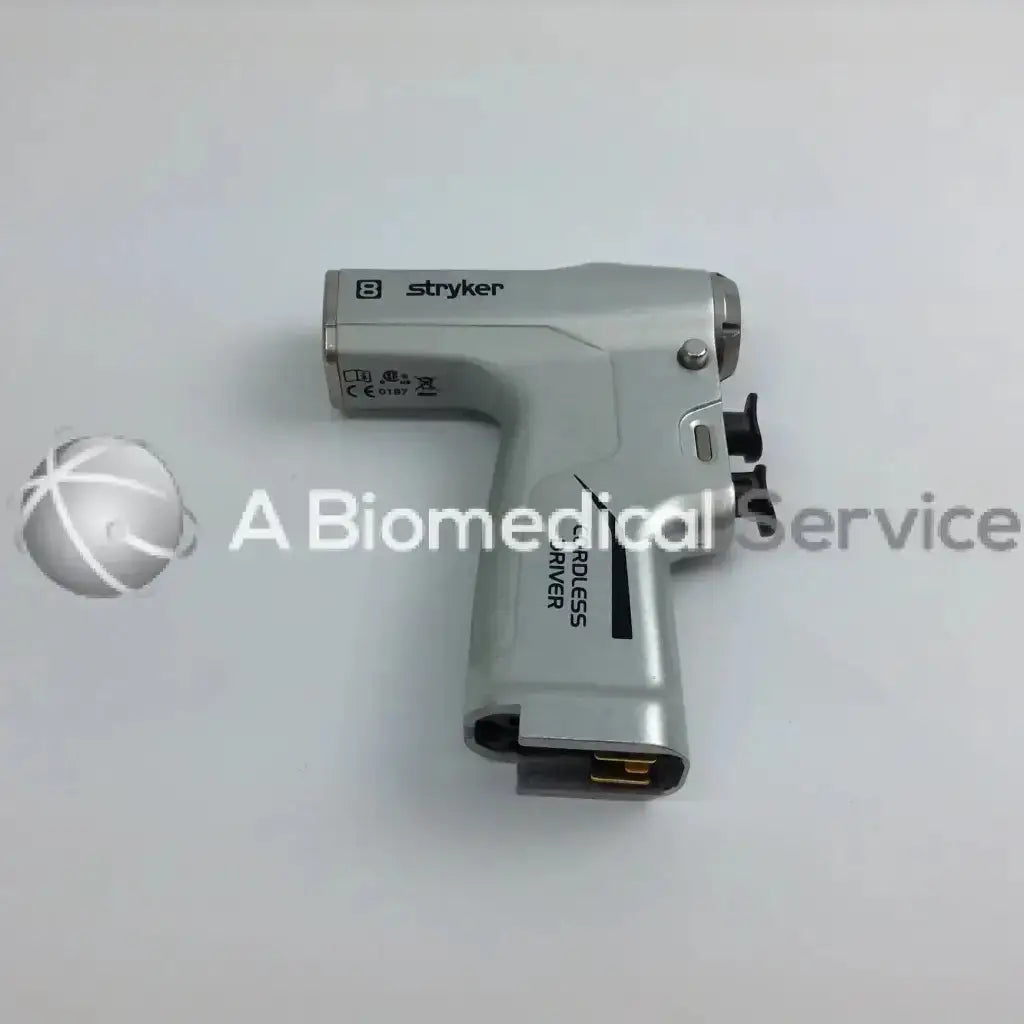 Stryker 4505 cordless driver set with silver handheld surgical driver featuring textured grip and aesculap case storage