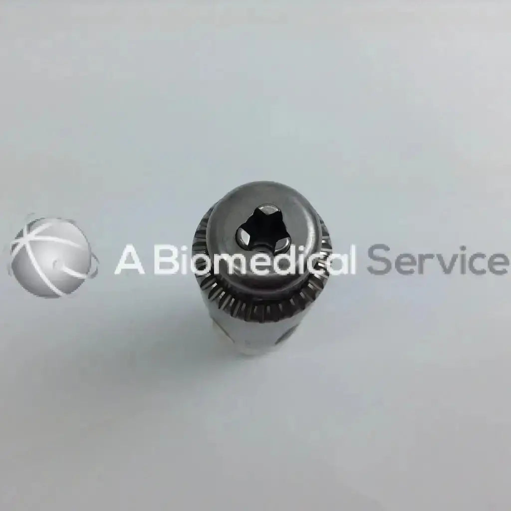 Silver metallic surgical drill bit with hexagonal drive and textured surface in stryker 4505 cordless driver set aesculap case