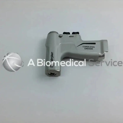 Gray stryker cordless driver with black accents in a sleek ergonomic design from the stryker 4505 driver set with aesculap case