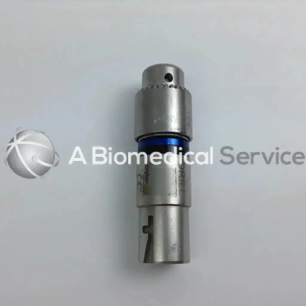 Silver metallic surgical drill bit with blue ring and engraved markings in stryker 4505 cordless driver set aesculap case