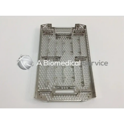 Stainless steel surgical instrument tray with perforated design and reinforced edges in aesculap case for cordless driver set