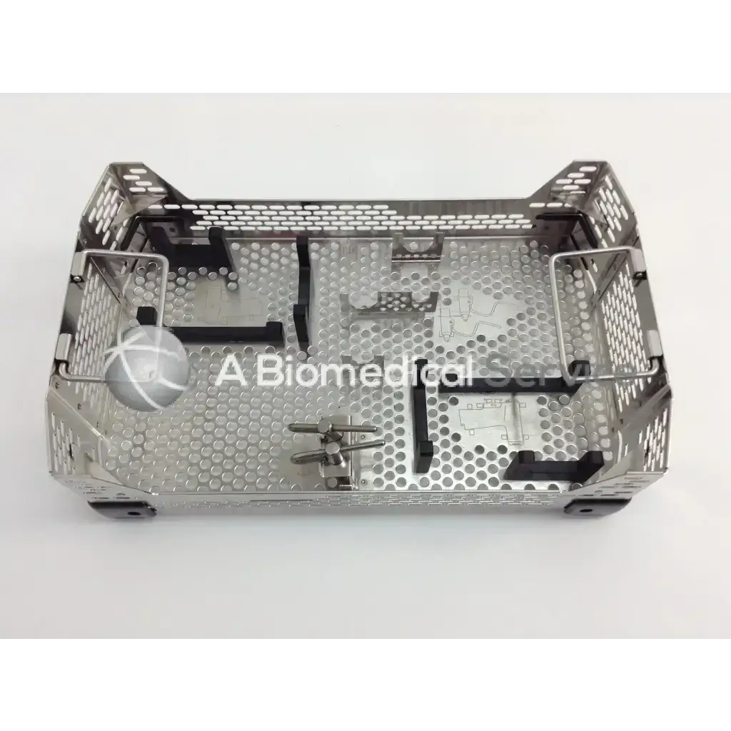 Stainless steel surgical instrument tray with perforated design and molded compartments in aesculap case for cordless driver set