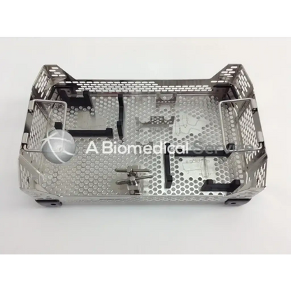Stainless steel surgical instrument tray with perforated design and molded compartments in aesculap case for cordless driver set