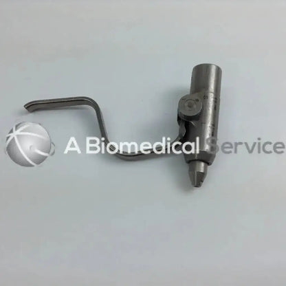 Stainless steel surgical retractor with curved arm and cylindrical handle in stryker 4505 cordless driver set with aesculap case