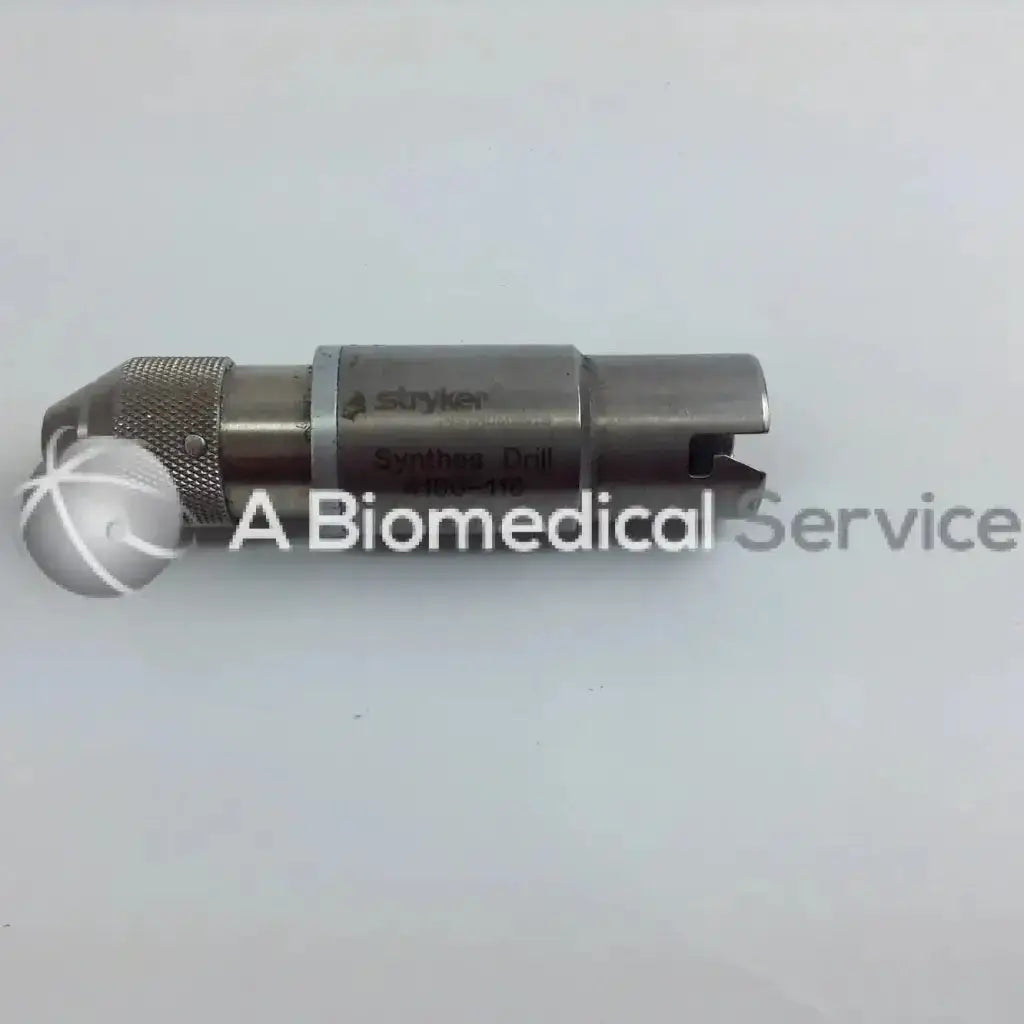 Silver metallic skyker synthes drill bit with textured grip and engraved branding in stryker 4505 cordless driver set aesculap case