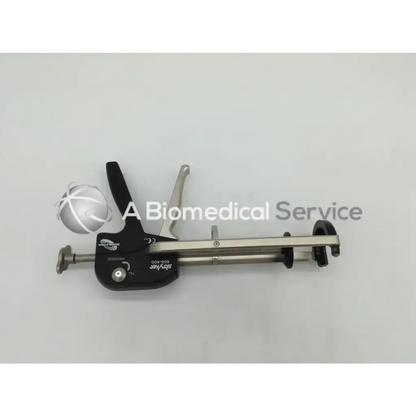 Stryker 606-600 revolution cement gun in black and silver with handle lever mechanism and measurement scale