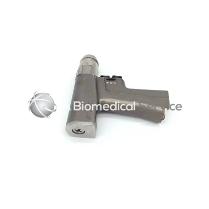 Gray metallic dual trigger rotary handpiece with cylindrical handle and rounded head for surgical use from stryker