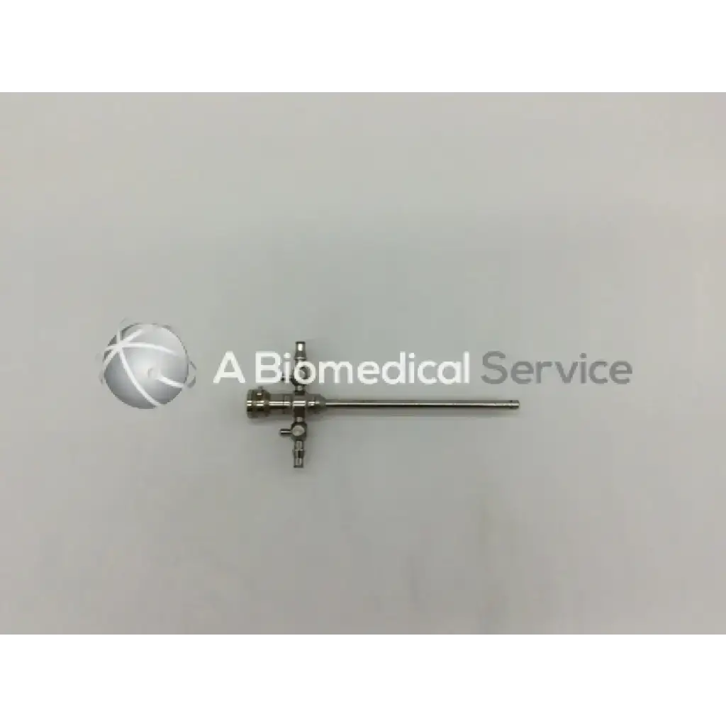 Stryker 747-031-550 stainless steel 5.8mm cannula with long shaft and three interconnected valves for surgical use