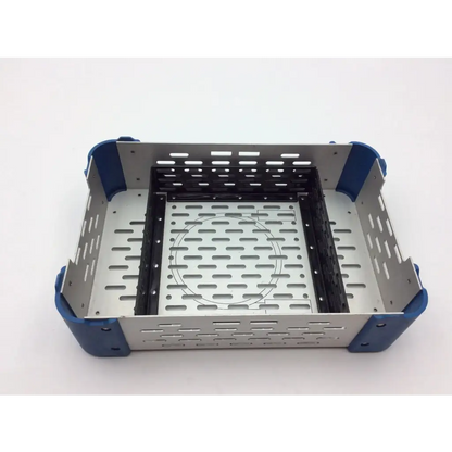 Silver and blue perforated metal surgical instrument tray for stryker battery powered micro CD 3 sabo saw sterilization case
