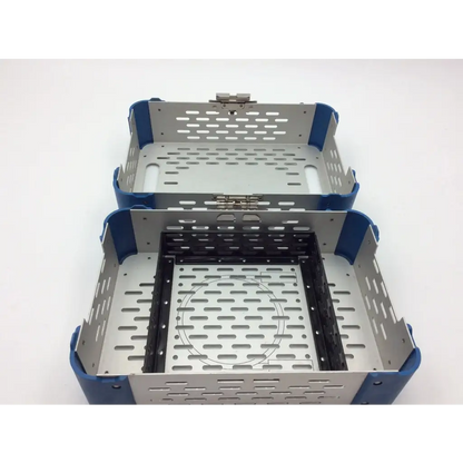 Blue and silver stryker battery powered micro cd 3 sabo saw sterilization case with perforated metal sides and black divider
