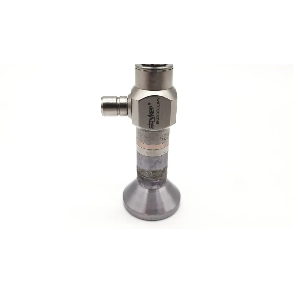 Silver-colored metallic stryker endoscopy 380-10 0° laparoscope with hexagonal body and transparent cylindrical section