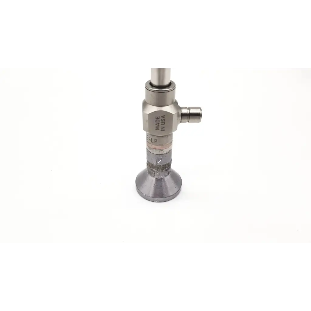 Silver metallic surgical valve with hexagonal body and threaded connections for stryker endoscopy laparoscope da46-91