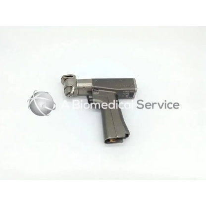 Gray metallic surgical drill with textured grip and ergonomic design in stryker endoscopy ref system 6 device
