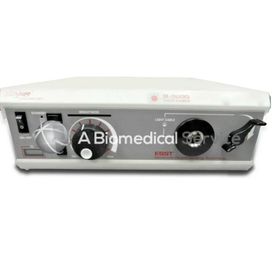 White rectangular stryker q5000 xenon light source unit with black dials labeled b-300d watt xenon light source