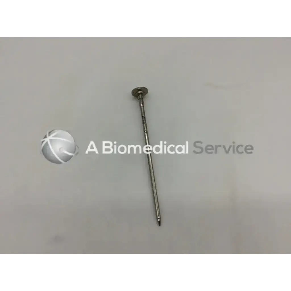 Metallic silver stryker surgical 5.8mm pencil tip obturator with rounded head and pointed tip for precise insertion