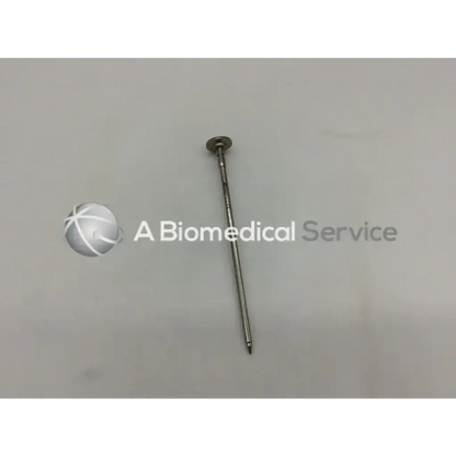 Metallic silver stryker surgical 5.8mm pencil tip obturator with rounded head and pointed tip for precise insertion