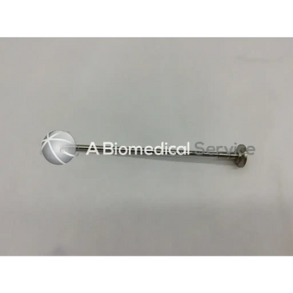 Silver-toned stryker surgical 5.8mm pencil tip obturator with spherical cross-hatched end and cylindrical shaft with flat disc