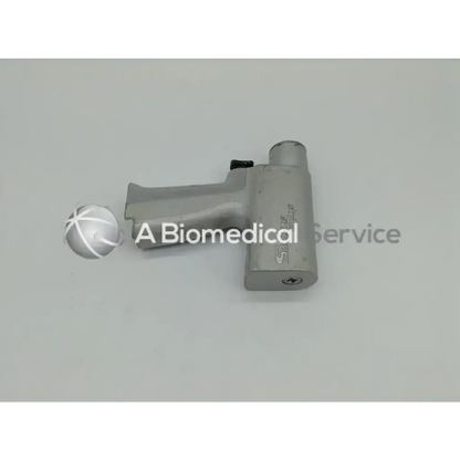 Silver metallic air-powered double trigger rotary drill with ergonomic handle and cylindrical nozzle by stryker system 5