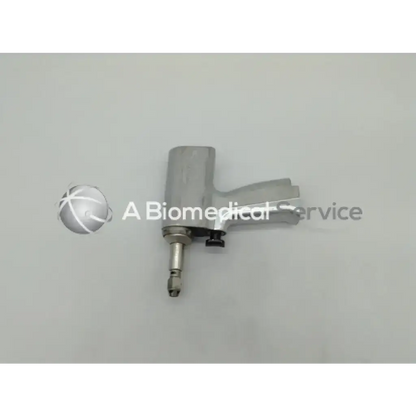 Silver metallic orthopedic reciprocating pneumonic nailer with ergonomic grip and threaded tip for precision use