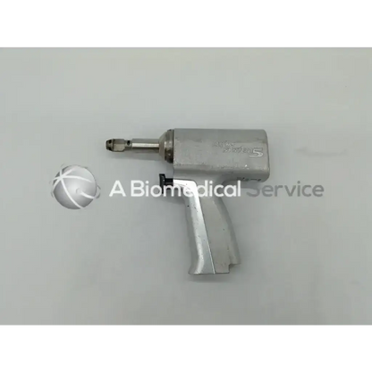 Silver metallic stryker system 5 orthopedic reciprocating saw handpiece with textured grip and engraved branding