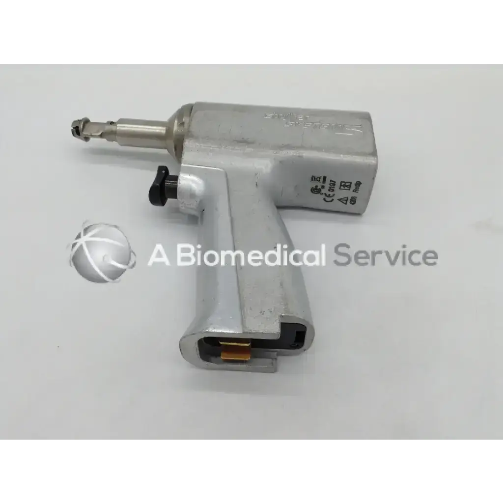 Silver orthopedic reciprocating surgical handpiece with black adjustment knob and engraved certification marks by stryker