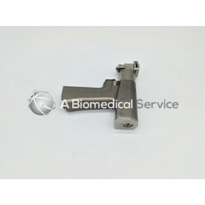 Silver metallic Stryker system 6 dual trigger rotary drill with handle and articulated head surgical instrument