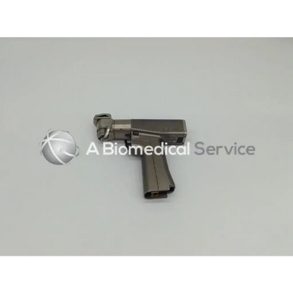 Gray metallic surgical osteotome with textured grip and precision head for stryker system 6 dual trigger rotary drill