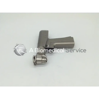 Gray ergonomic handle with metallic cylinder attachment for stryker system 6 dual trigger rotary trigger rotary drill