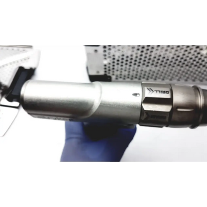 Silver ttiq brand bone battery powered drill with metallic finish and textured grip from stryker system 7 large bone set