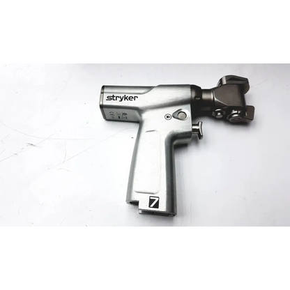Silver stryker system 7 large bone battery powered drill with sleek metallic finish and black handle accents