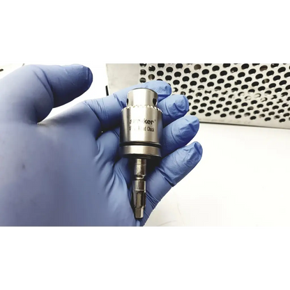 Metallic cylindrical dental handpiece chuck with polished chrome finish for stryker system 7 large bone battery drill