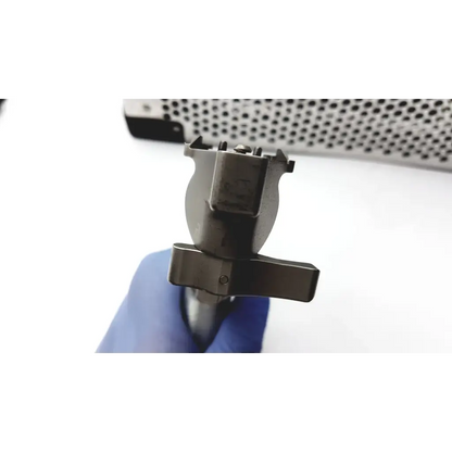 Silver metallic rectangular mechanical component with tabs for stryker system 7 large bone battery powered drill set