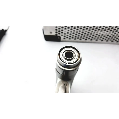 Black and silver stryker system 7 large bone battery powered drill with polished metallic shaft and precision bearing assembly
