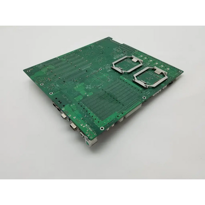 Green printed circuit main board with two silver cpu socket frames and ports super micro x6dh8-xg2csi