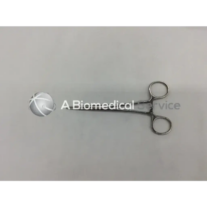 Stainless steel kelly classic hemostatic forceps with rounded handles and smooth reflective surface for surgical use
