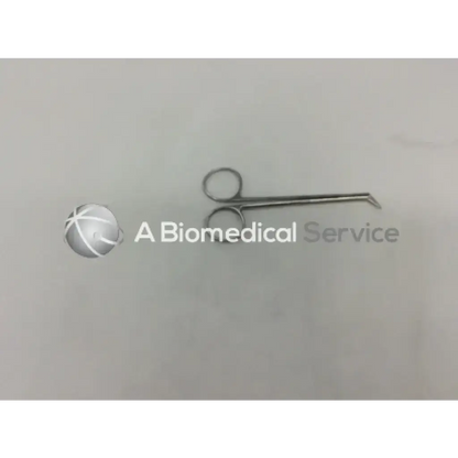 Silver surgical potts smith scissors with curved pointed tips and circular handles for precise surgical use