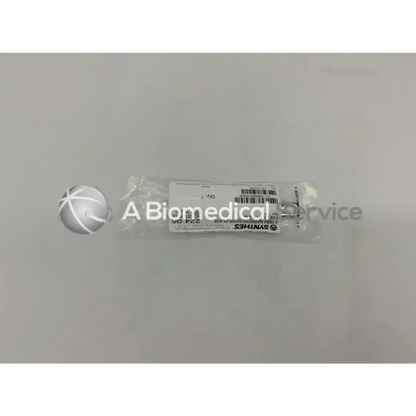 A sterile clear plastic-wrapped synthes narrow dcp plate 4.5mm 6 holes 103mm with barcode and product info