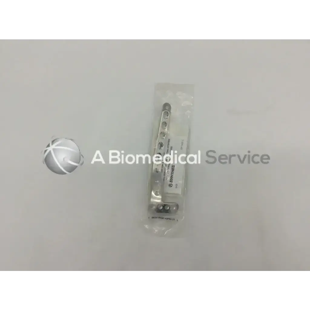 Silver metallic lcp proximal tibia plate 8 holes 133mm right from Synthes in clear plastic packaging