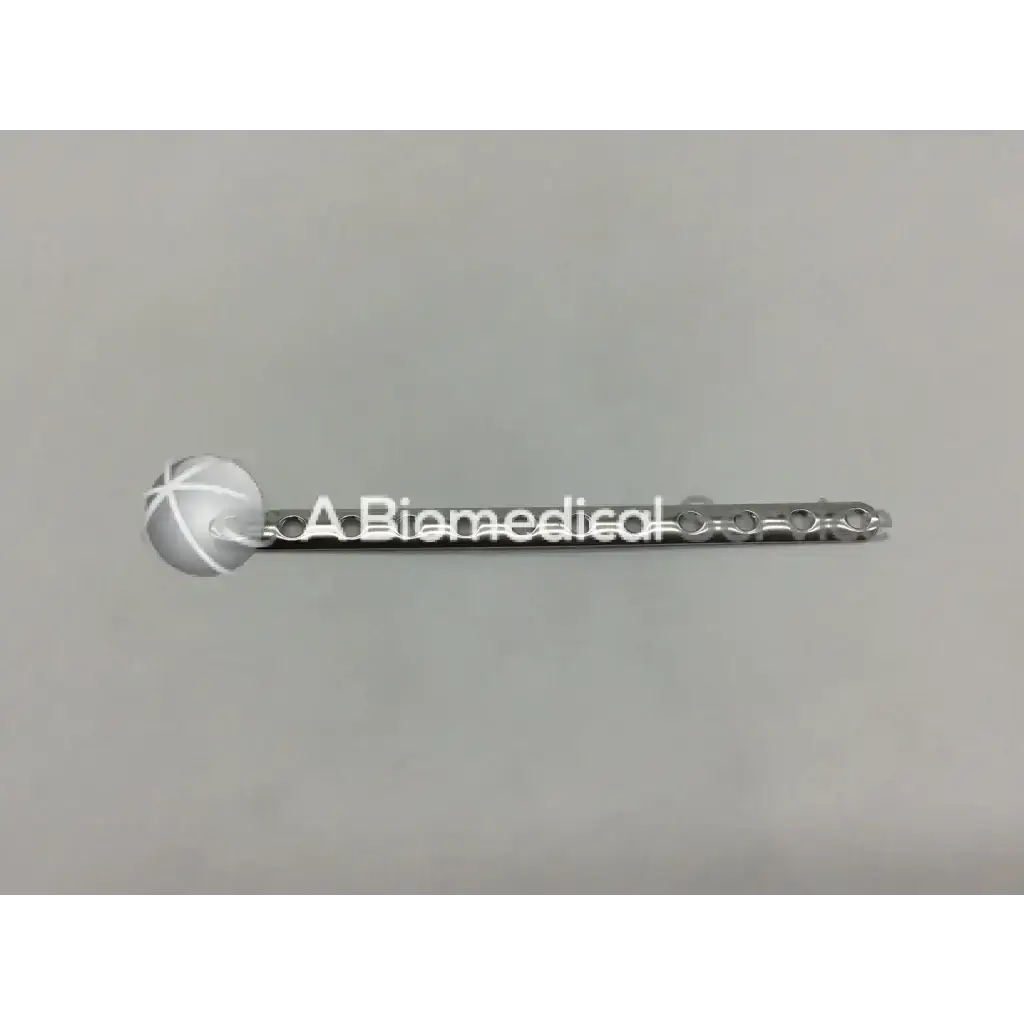 Silver metallic Synthes 241.421 third tubular plate with collar spherical end cap and 12 holes 141mm length