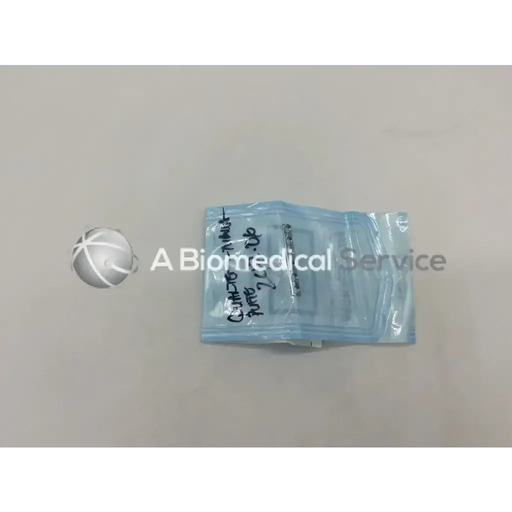 A light blue transparent plastic pouch containing synthes 242.06 quarter-tubular plate with collar 6 holes ad5-159