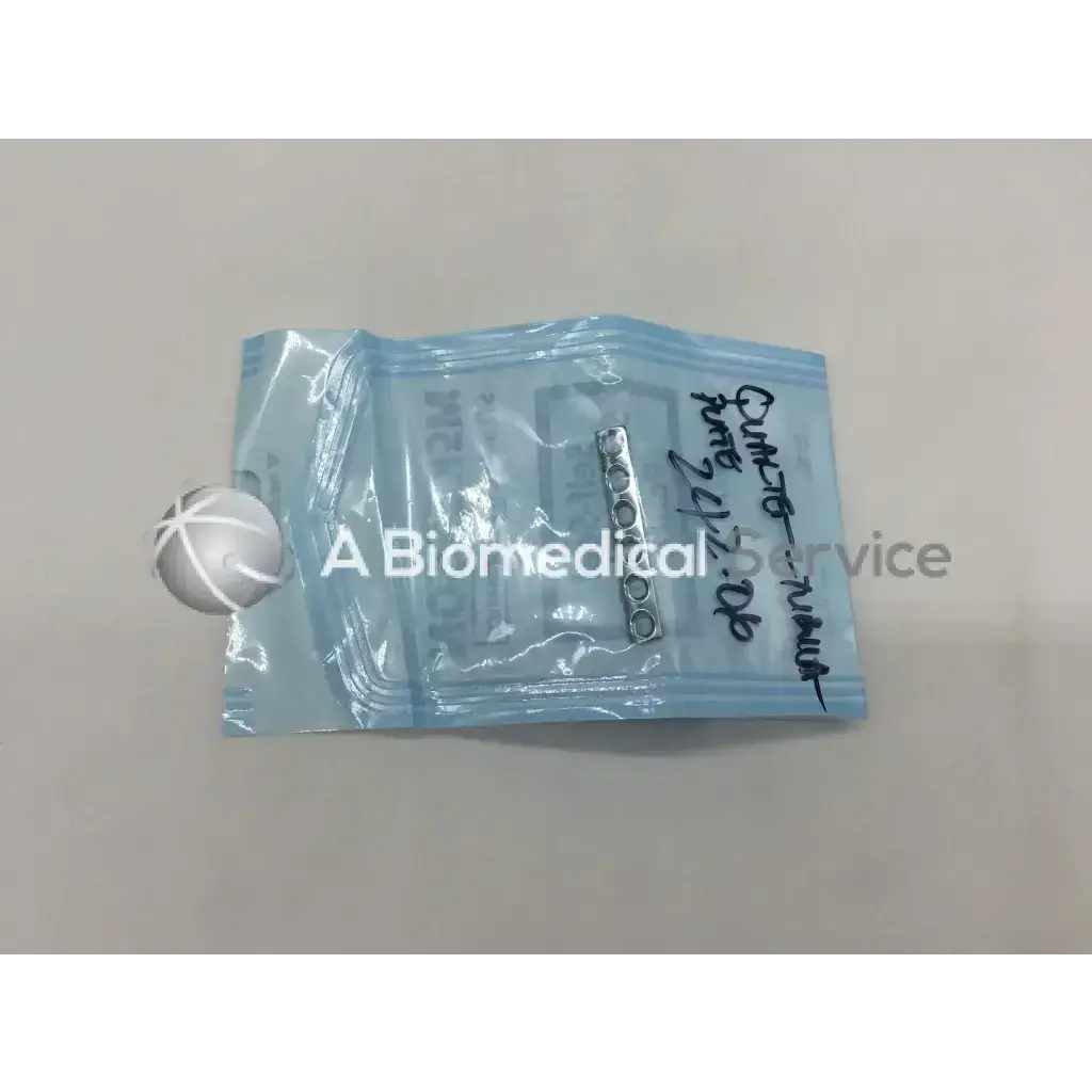 Light blue sterile packaging containing a small metallic synthes 242.06 quarter-tubular plate with collar and 6 holes ad5-159
