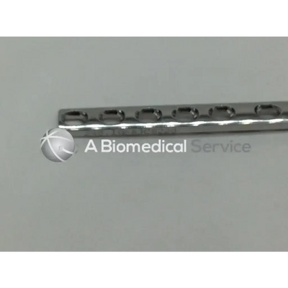 A sleek metallic syntheses 248.10 dcp surgical plate with 10 oval holes 3.5mm x 121mm ad5-160 121322sm