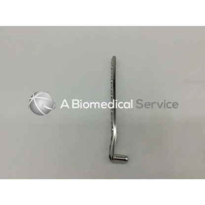 A sleek metallic Synthes dcs plate12 holes with curved design and evenly spaced holes for surgical use