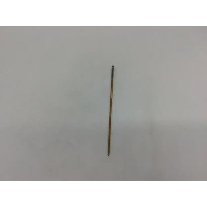 Slender gold-toned synthes 311.33 cortex screw ac4-157 with threaded shaft and flat head for precise bone fixation