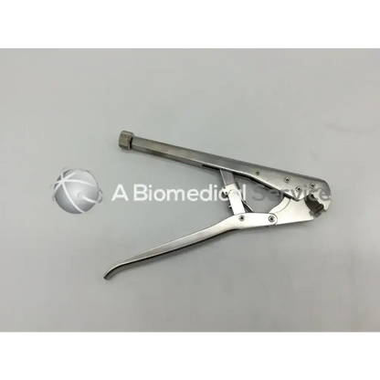 Stainless steel synthes 329.291 surgical clamp with textured grip and adjustable jaw for 5mm clavicle plates
